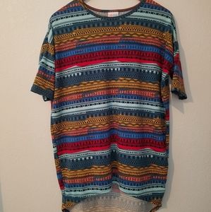 Tunic top. Runs big. I usually wear a S/M top